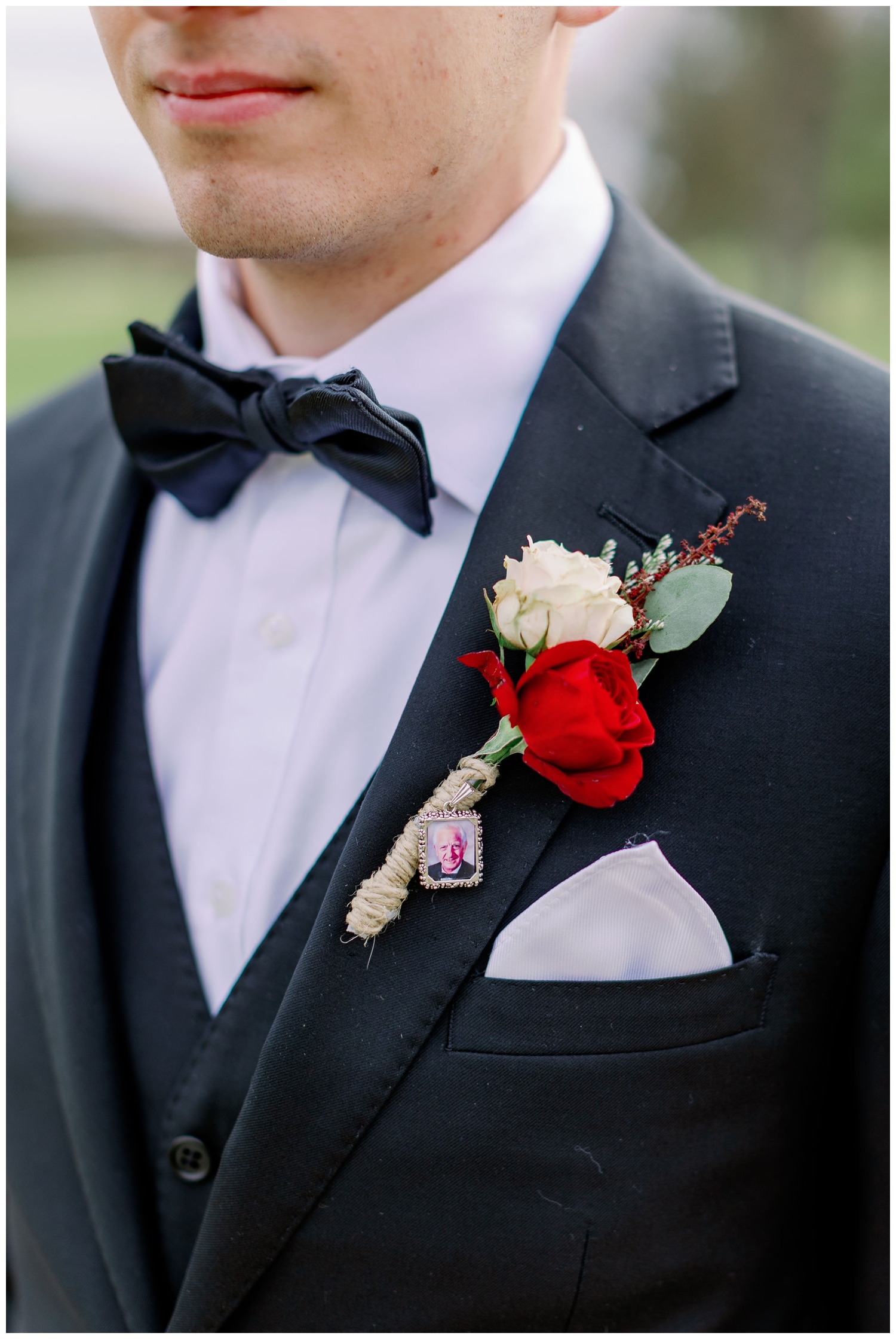 detail shot of groom in black tux
