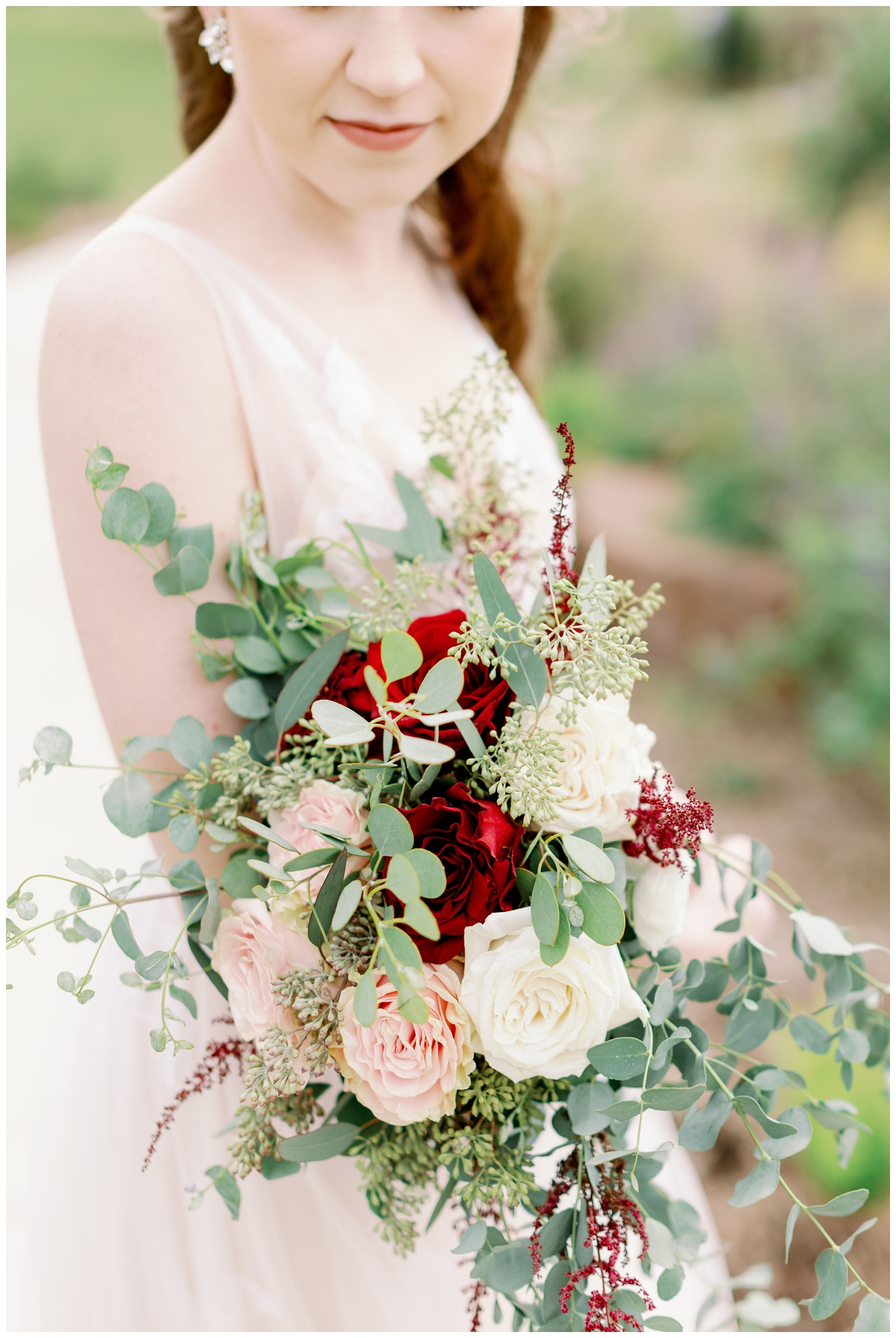 closeup image of burgundy and white bridal bouquet