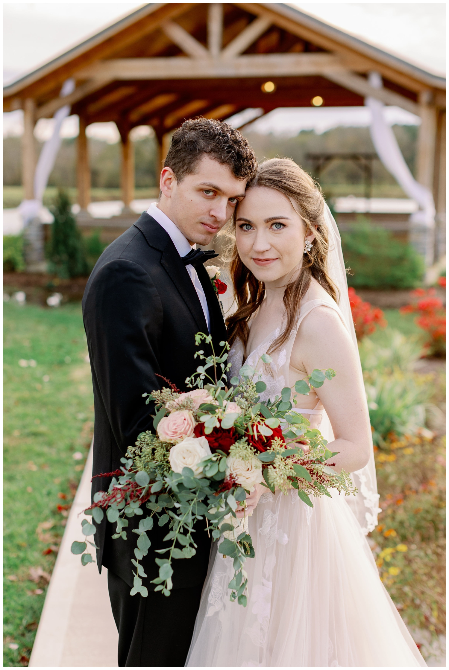 bride and groom foreheads together smiling winter Union Ranch wedding