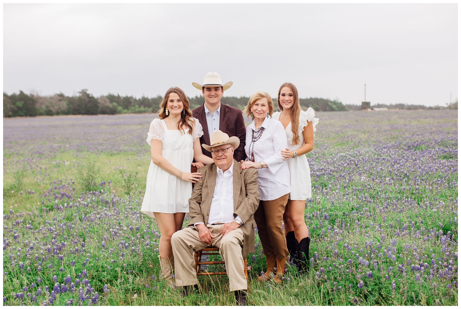 family portrait by Reed Gallagher Photography in bluebonnet field Houston