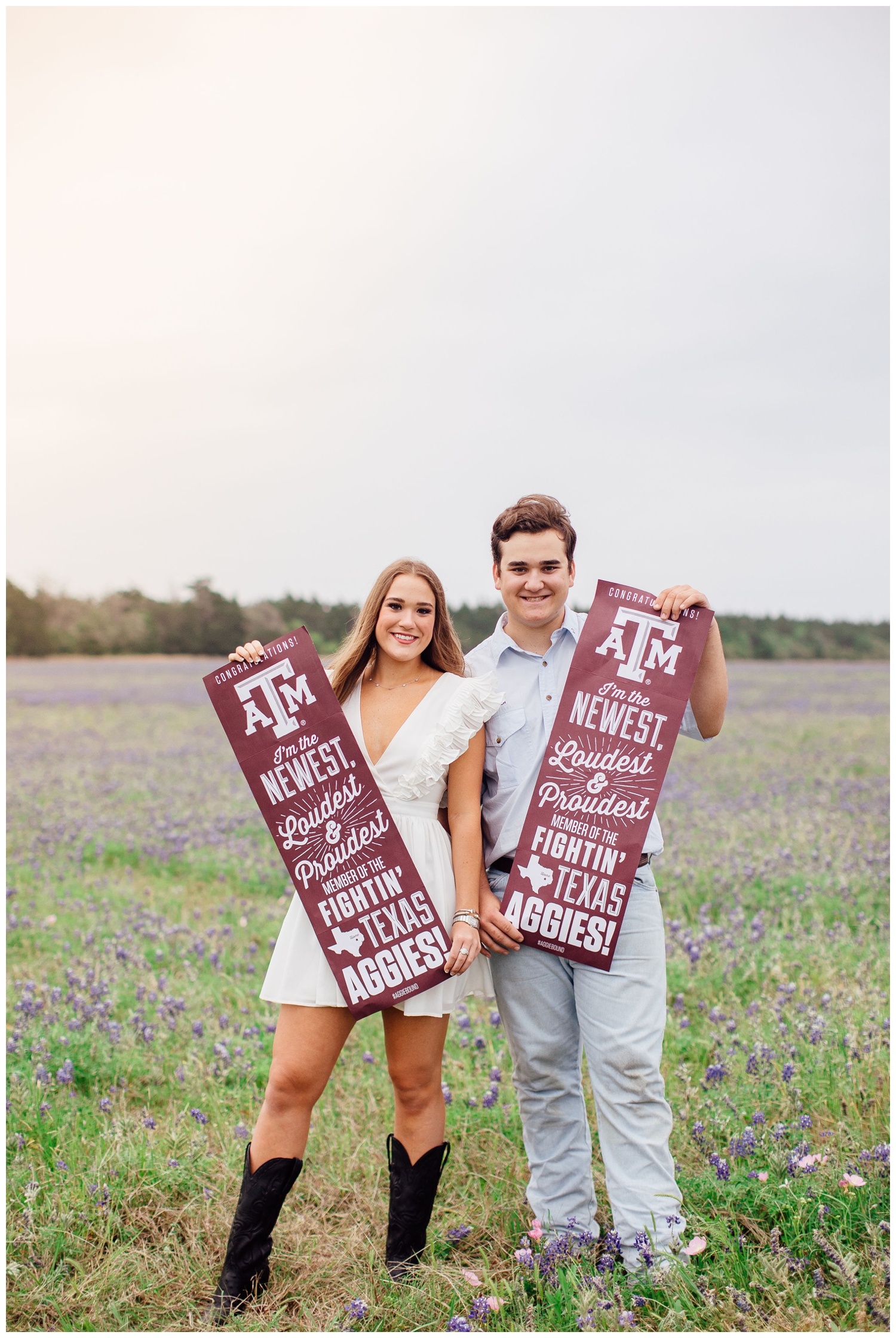 high school senior brother and sister twins standing in bluebonnet field holding Aggie sign for Senior Pictures for Guys 