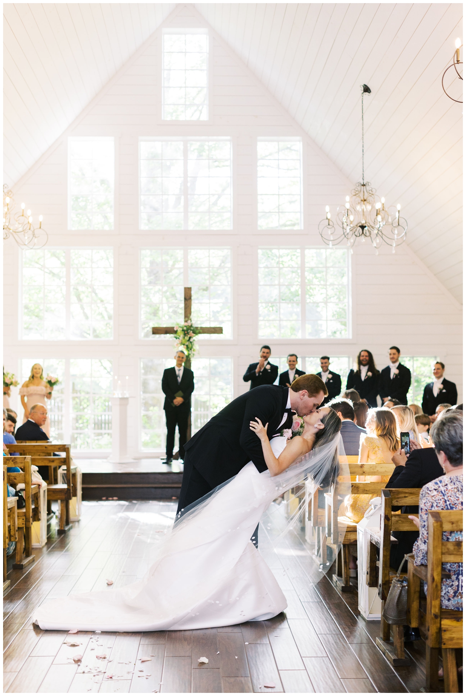 Carriage House Houston wedding chapel bride groom kissing