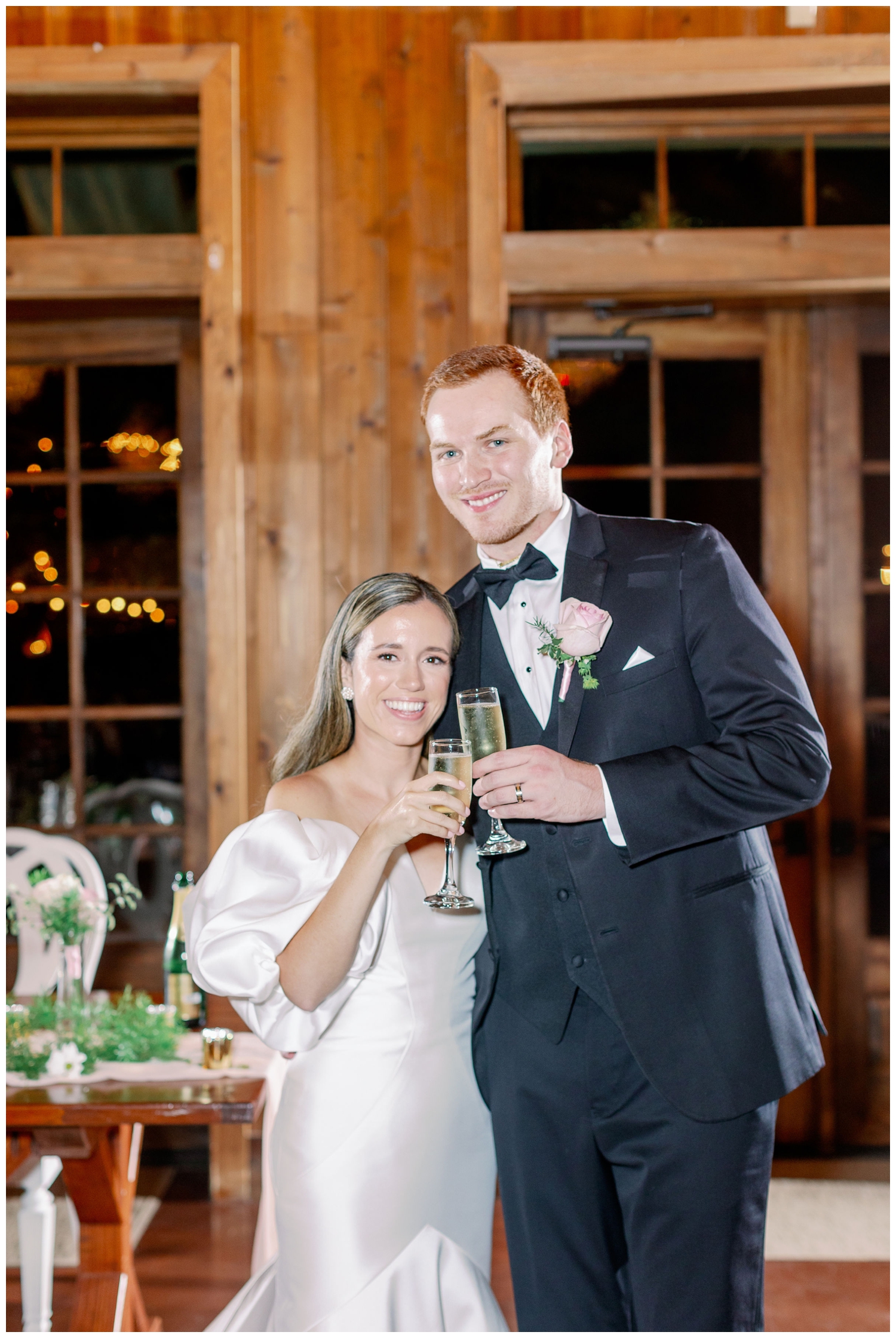 bride and groom champagne toast at reception The Carriage House Houston