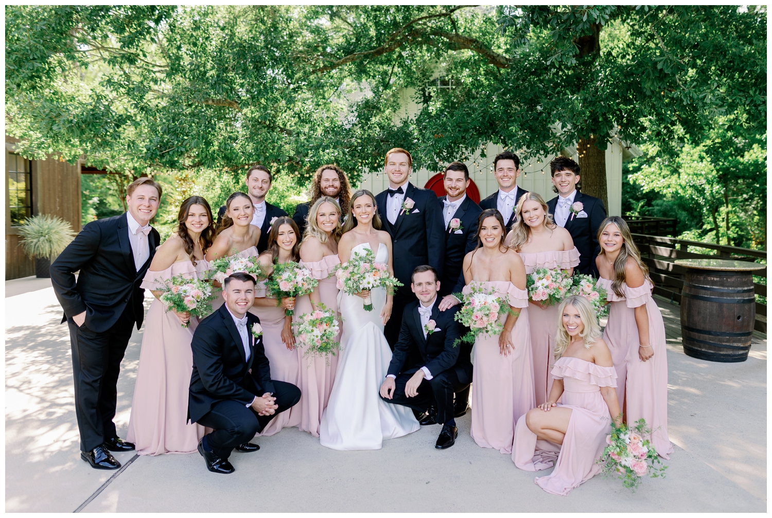 bride and groom wedding party in black suits and blush dresses The Carriage House