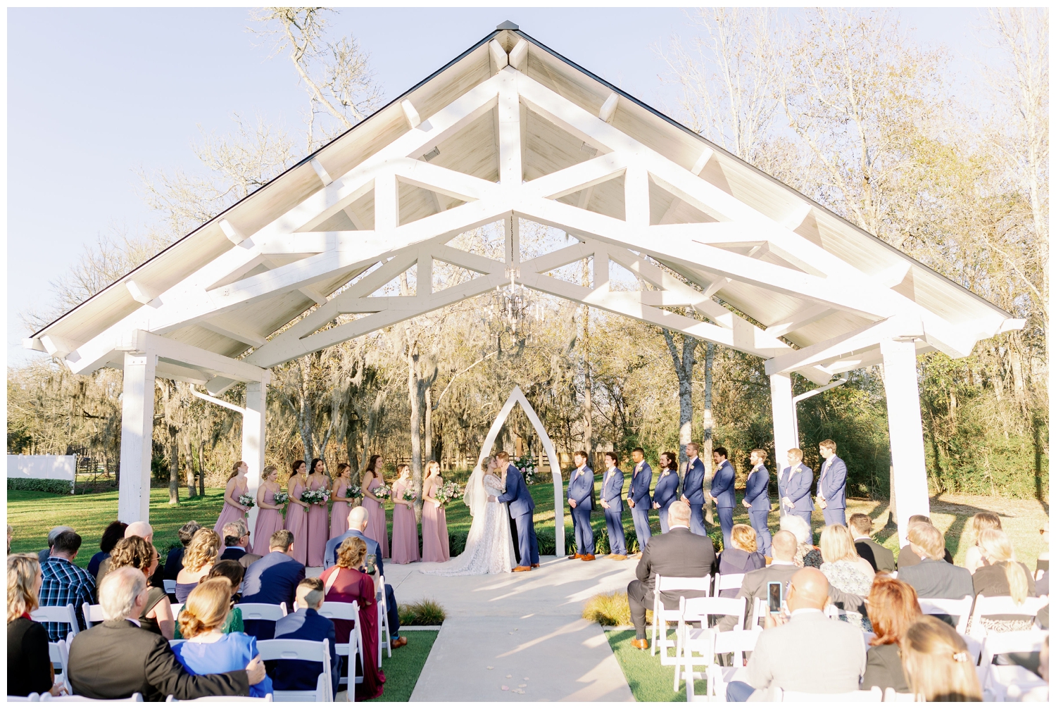 The Springs Wallisville Wedding ceremony outdoors blush and blue
