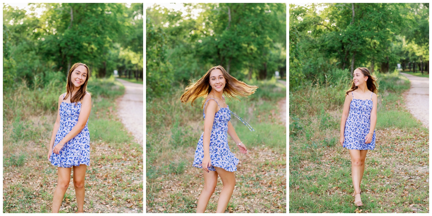 Houston senior girl in blue sundress spinning in a field