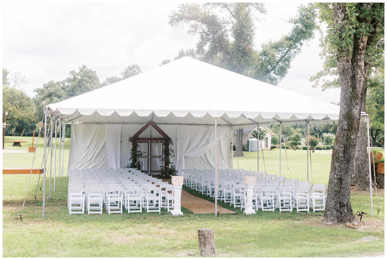 white tent outdoor wedding ceremony set up in Madisonville Texas