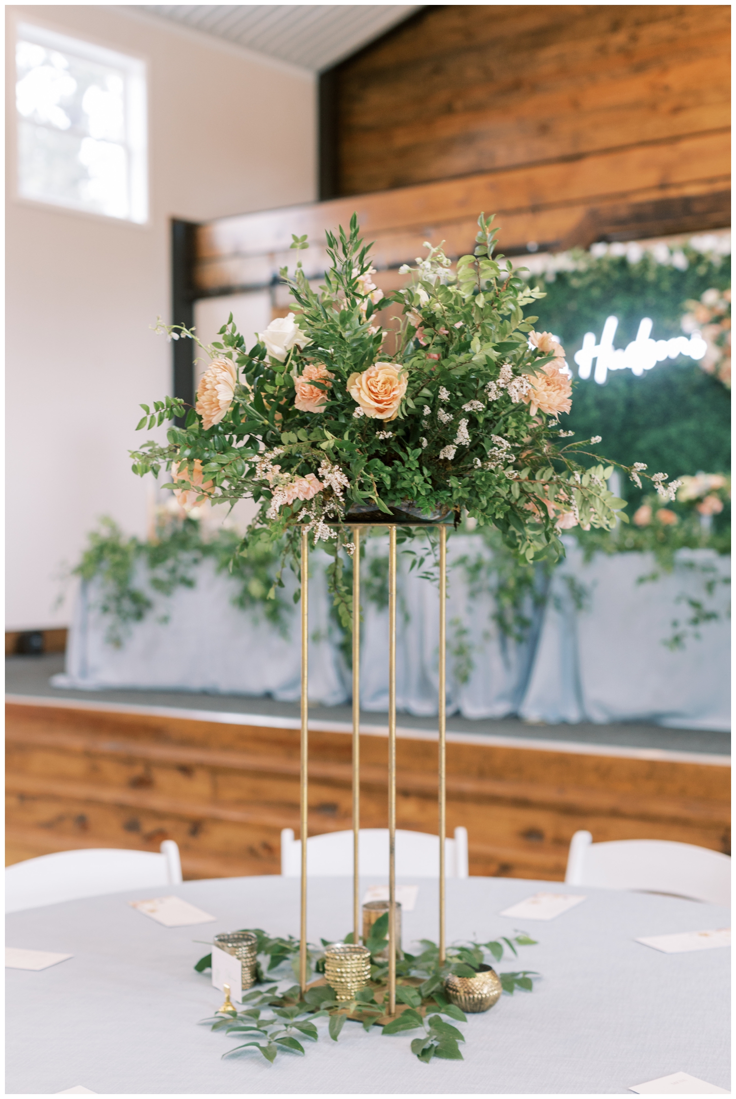 tall peach floral table centerpiece