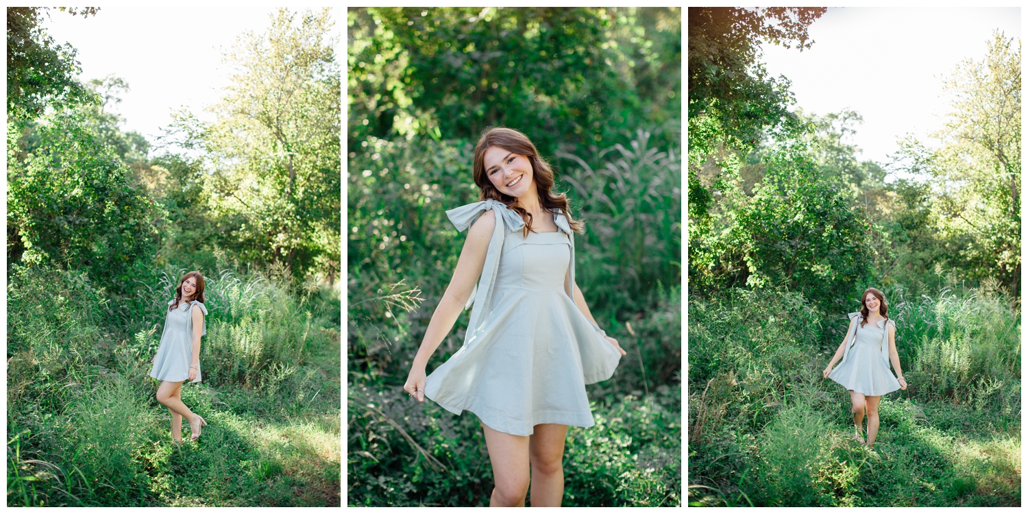 high school senior girl twirling in a field for fall senior photos Houston