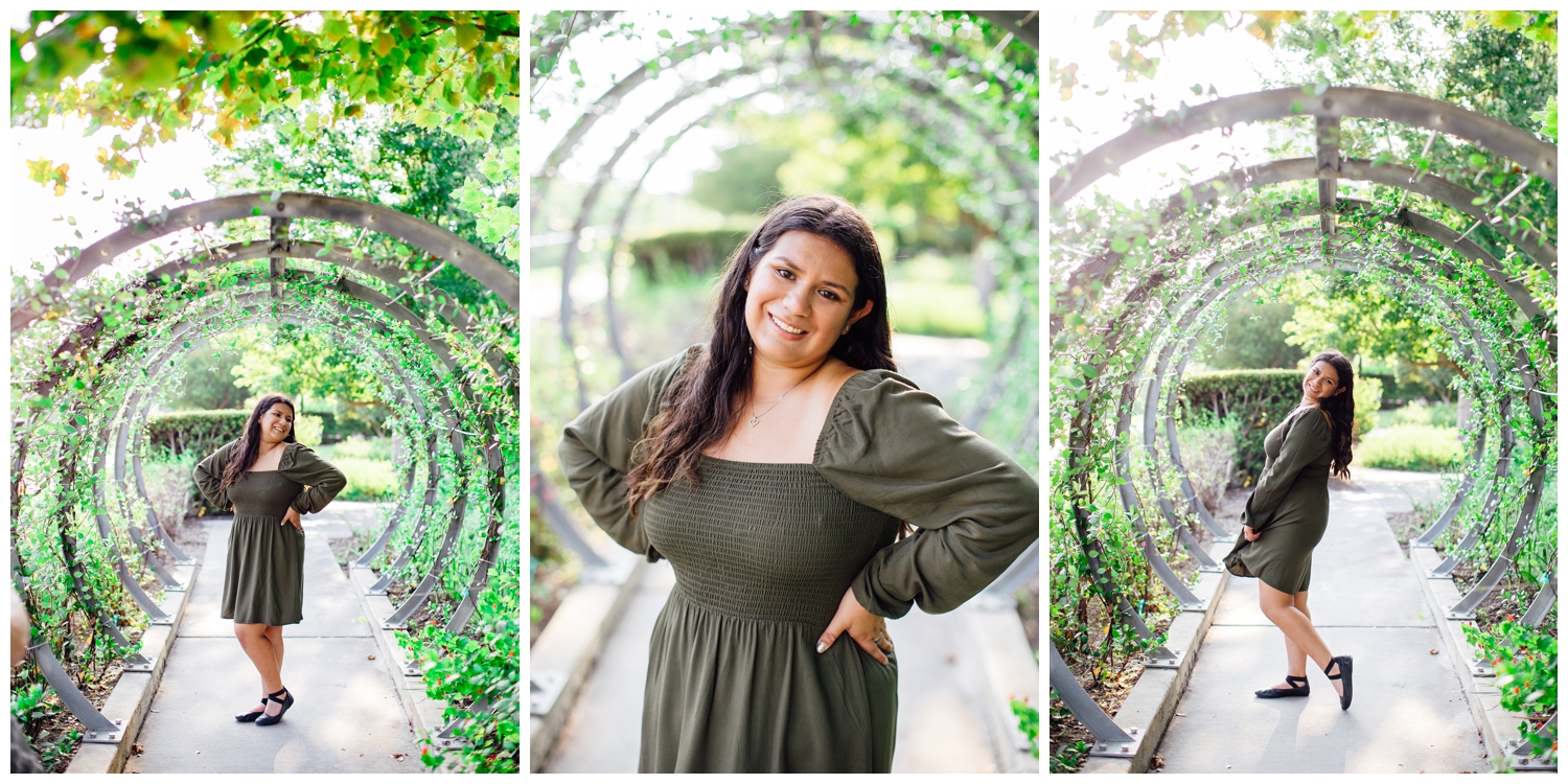 Senior Photos in Houston outdoors girl in green dress standing in archway at Sabine Street