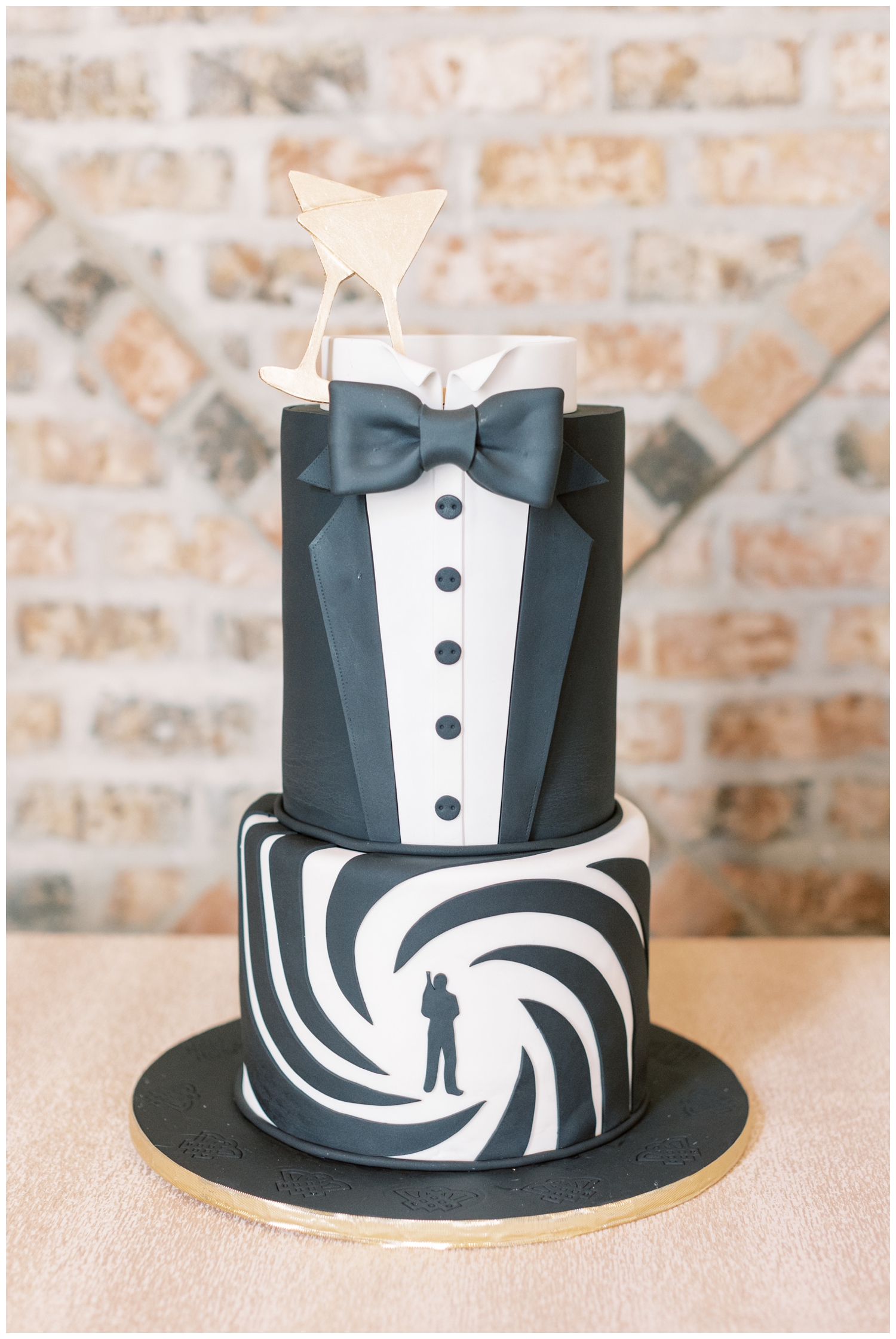 black and white tuxedo cake inside elegant Iron Manor Wedding