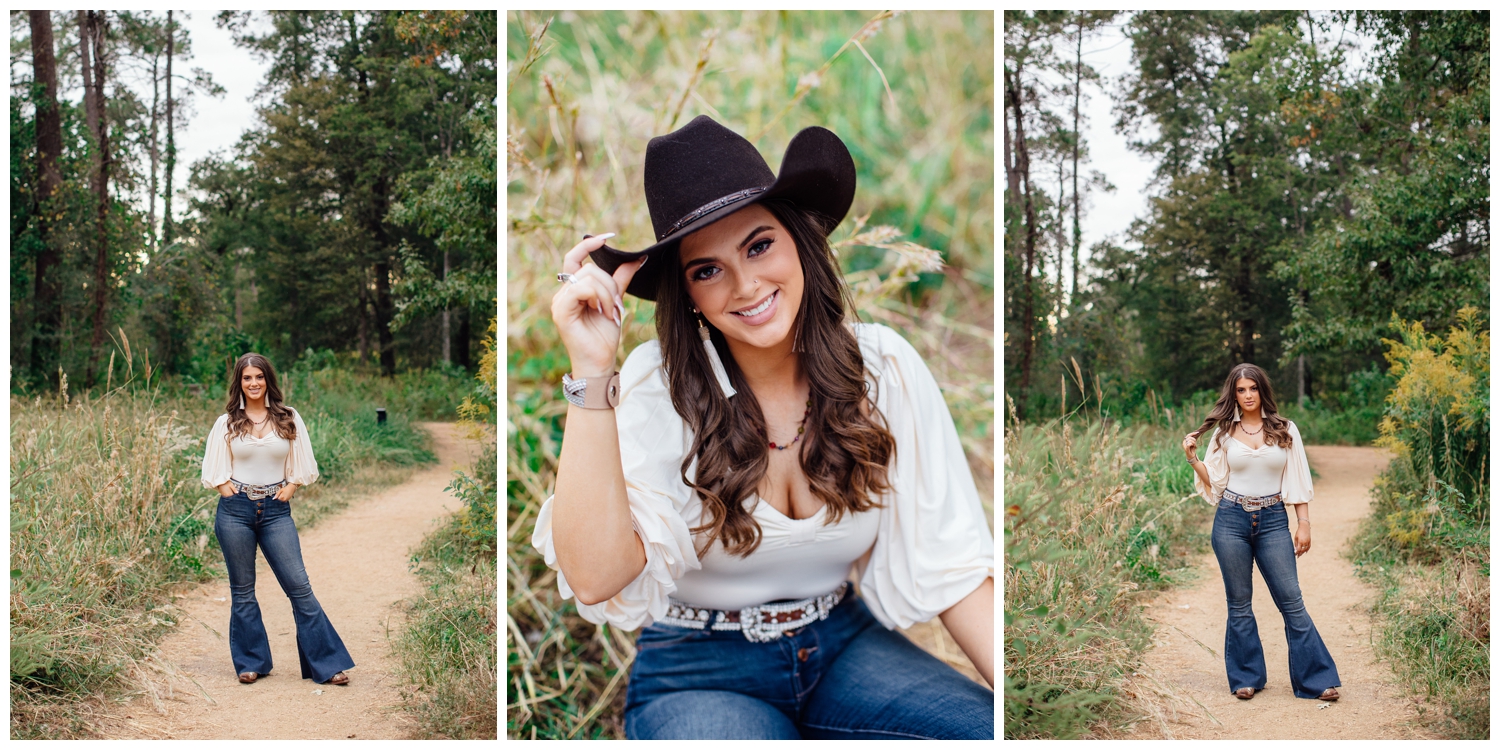 girl in jeans and cream shirt wearing black cowboy hat bold senior portraits in Houston Arboretum
