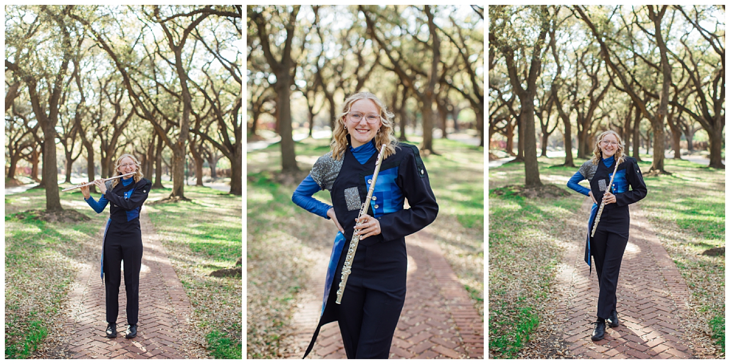 girl in blue band uniform holding a flute for colorful Houston senior session