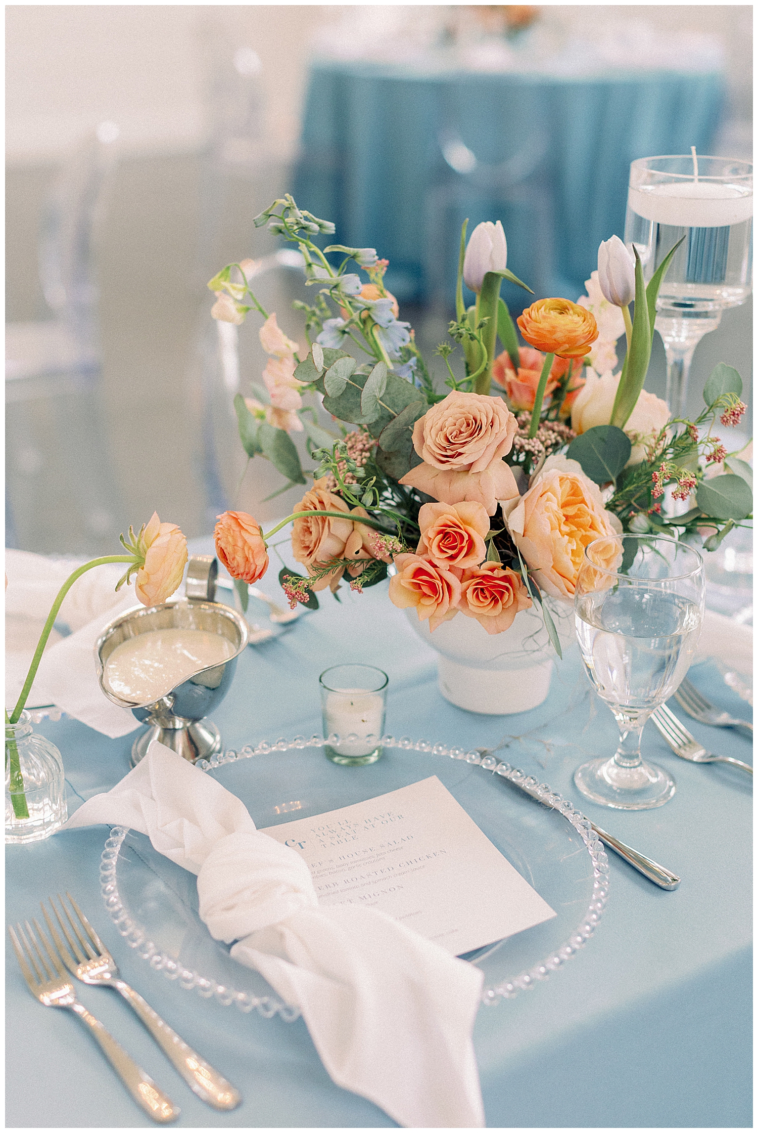 light blue tablescape with placesetting