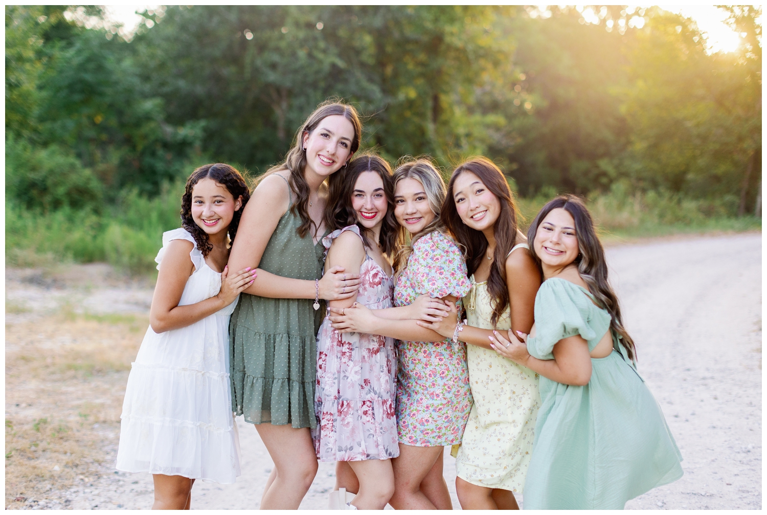 class of 2024 senior rep team Houston for Reed Gallagher Photography with girls in sundresses