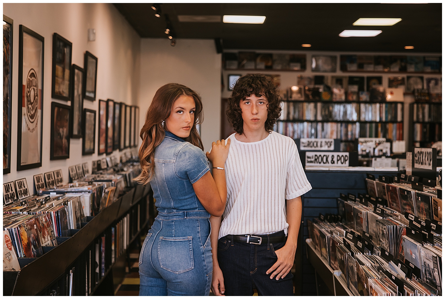 high school boy and girl twins standing at Cactus record store senior pictures Houston