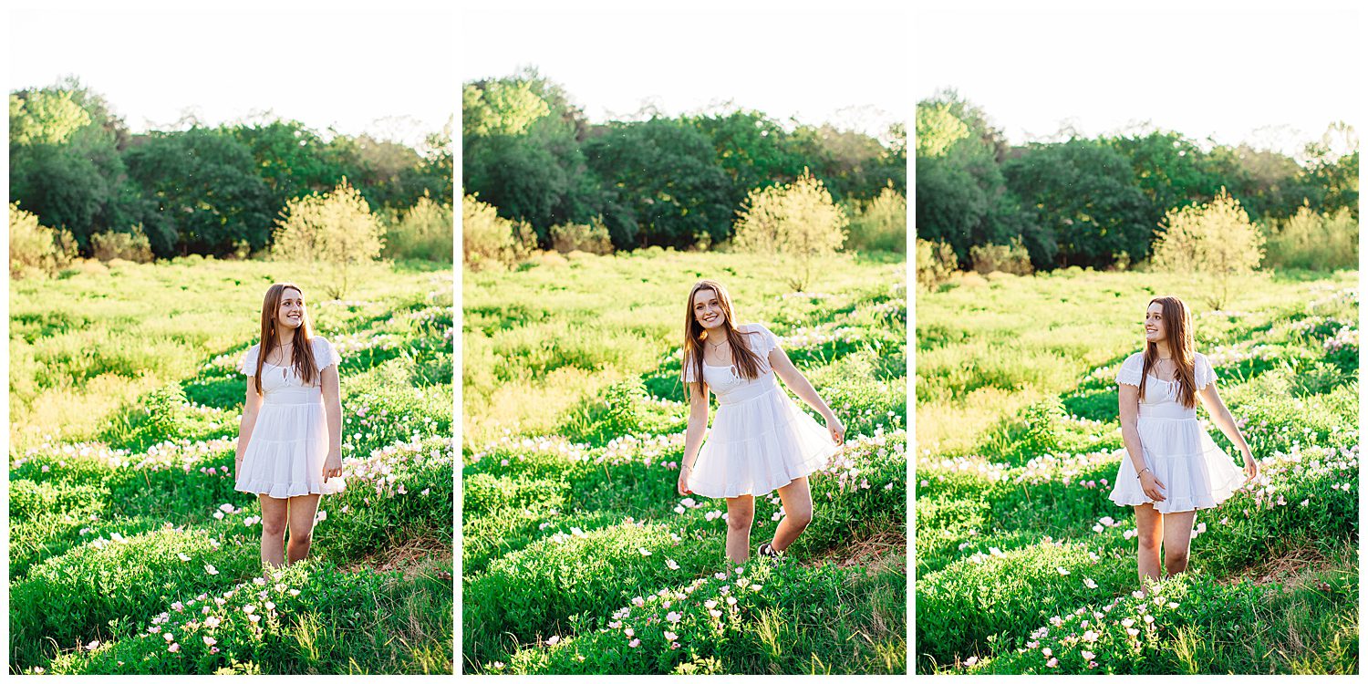 spring senior portraits Houston field with girl in white sundress walking